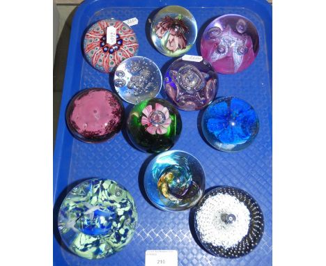 A collection of eleven glass paperweights, to include Caithness Checkpoint, Scotland 