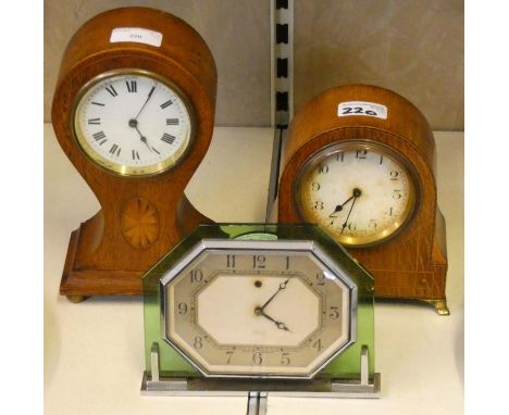 Two inlaid mahogany cased manual wind mantle clocks, together with an art deco Smiths electric mantle clock. (3) 