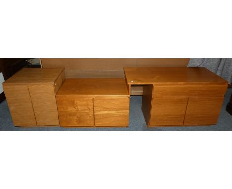 A Tapley 33 combination unit, a single drawer over cupboard unit 67 cm high, with extending top to meet a lower 52 cm high cu