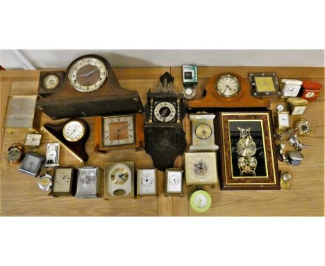 An inlaid mahogany manual wind mantle clock, together with a Westminster chime mantle clock and various other carriage and tr