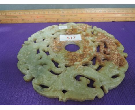 A jade Hetian Bi 'coin' of dragon form