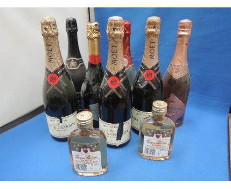 Seven bottles of sparkling wine, including three bottles of Moet and Chandon Brut Imperial Champagne, plus two small bottles 