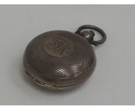 An Edwardian silver sovereign case having engine turned decoration and initials to cartouche, Birmingham 1907, maker mark wor