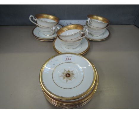 A Royal Crown Derby part tea service in gilt heightened decoration