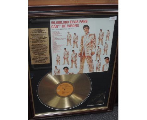 An Elvis Presley Collectors Montage 'Elvis Golden Records Vol II , 24ct gold plated disc and cover '