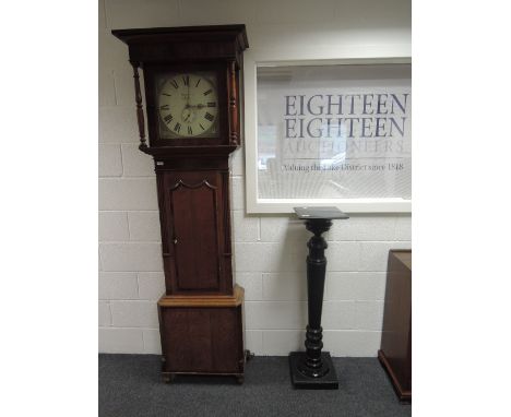 A late 18th century oak longcase clock having square pillar hood containing painted dial by Hargreaves, Settle, with 30 hour 