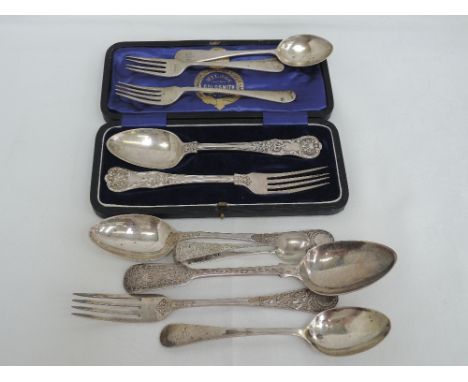 A cased Victorian silver spoon and fork having moulded decoration to terminals, London 1844, possibly William Eaton, another 