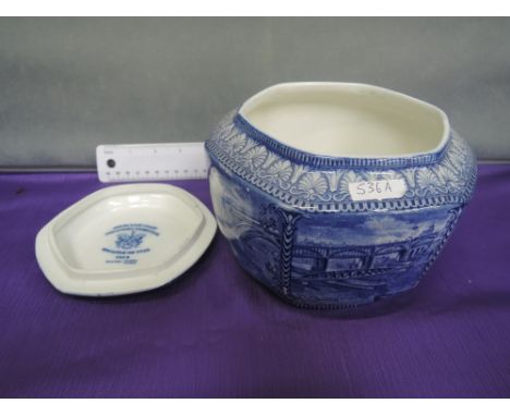 A Ringtons Maling pottery tea caddy having pictorial black and white decoration with script for The North East Coast Industri