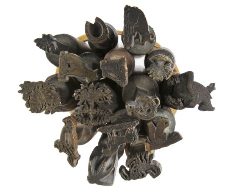 *Decorative finishing tools. Fifteen brass decorative finishing tools, comprising centre tools of traditional designs mostly 