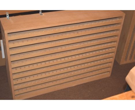*Finishing tool rack unit. A modern bespoke made finishing tool rack, for wall mounting, finished in oak veneer, with eleven 