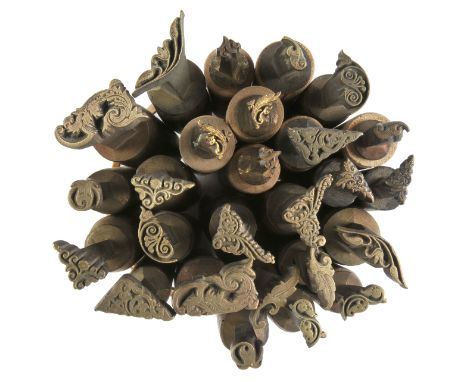 *Decorative finishing tools. Twenty brass decorative finishing tools, comprising 10 pairs of corner tools of traditional desi