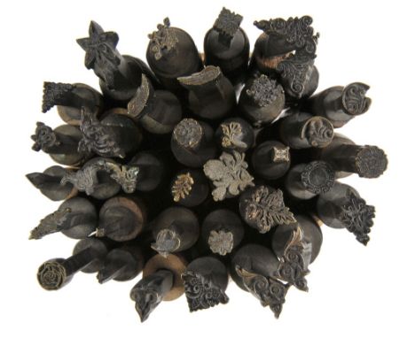 *Decorative finishing tools. Thirty-five brass decorative finishing tools, comprising centre & corner tools of traditional de