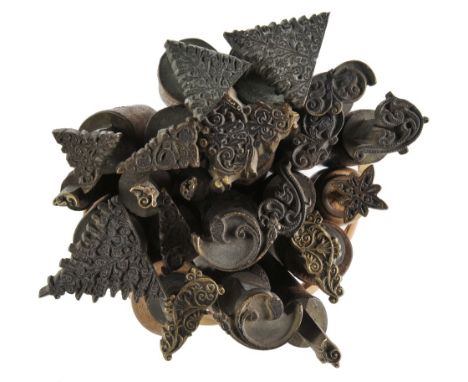 *Decorative finishing tools. Twenty brass decorative finishing tools, comprising corner & centre tools of traditional design,