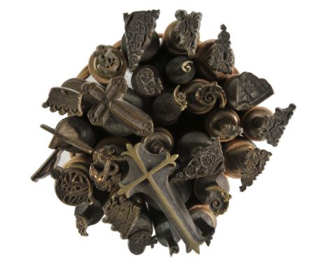 *Decorative finishing tools. Twenty-six brass decorative finishing tools, comprising centre & corner tools of traditional des