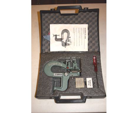 *Bookbinding hand tools & materials. A Scharf-Fix 2000 Leather Paring Machine, contained in original case, together with a se