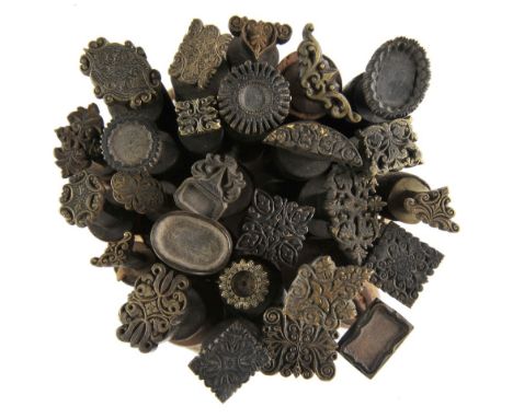 *Decorative finishing tools. Twenty-six brass decorative finishing tools, mostly comprising centre tools of traditional desig