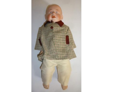 A Gebruder Knoch bisque shoulder head boy character doll with intaglio eyes, moulded hair, composition limbs and kid body, 15
