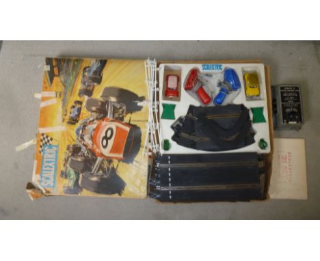 A Scalextric Sports Set 31 with two Mini Cooper C7 Rally Cars, box poor, and a Hornby II Power Control Unit (Est. plus 18% pr