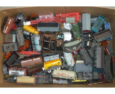 Approximately one hundred and eighty goods trucks by Hornby, Lima, Bachmann and others including tank wagons, coal trucks, go