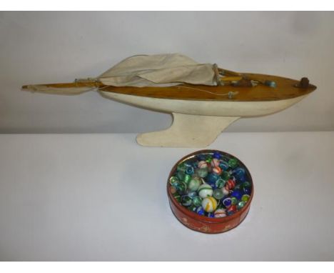 Approximately 140 old glass marbles, mainly 5/8" diameter, some larger, also some smaller brown ceramic marbles, in small cir