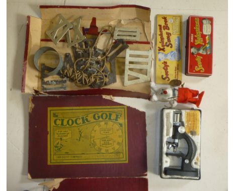 An early 20th century Clock Golf Set with cast metal Roman tee numbers 1-XII, centre rim and "hole", box poor, A "Sooty" Xylo