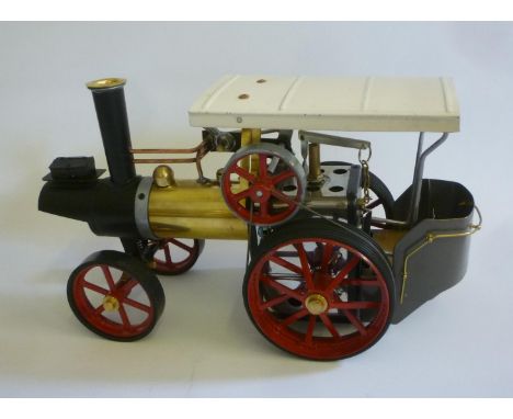 A Mamod Traction Engine with engineered modifications including canopy, boiler front, and scuttle seat conversion, never stea