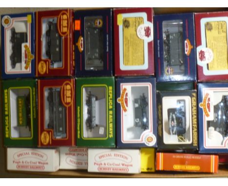 Approximately seventy five goods wagons by Hornby, Airfix, Mainline Bachmann and others including P.O. vans and wagons, coal 