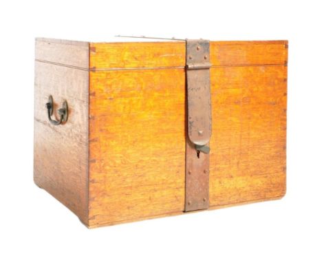 A Victorian 19th century oak campaign iron bound silver chest trunk / canteen of cutlery. The chest having a a cast iron band