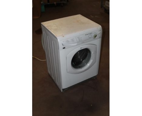 A Hotpoint 6 kg WF250 washing machine with 1500 spin, 85 cm x 60 cm x 53 cm.  CONDITION REPORT: Requires a good clean and the