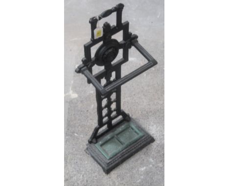 A Victorian cast iron umbrella or stick stand of geometric form with Lions head motif, cast to the reverse with registration 