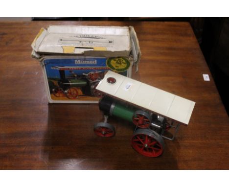 A Mamod steam tractor, boxed, together with a Mamod live steam stationary engine and a selection of various other toys.  COND