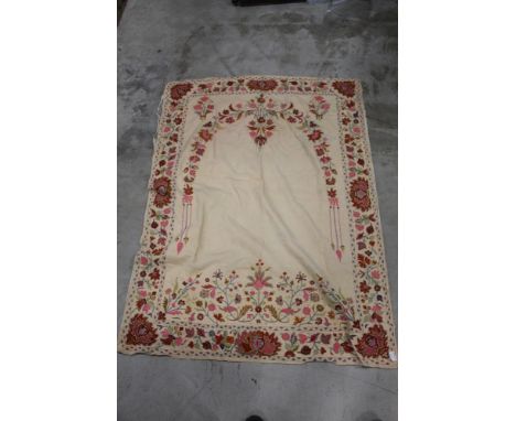 An early 20th century crewel work panel, profusely embroidered with foliate motifs. 157 cm x 115 cm.  CONDITION REPORT: Some 