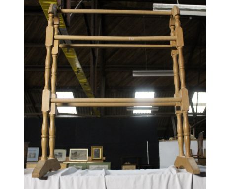 A modern light wood towel rail of traditional form, 78 cm x 61.5 cm. CONDITION REPORT: Good used condition. 