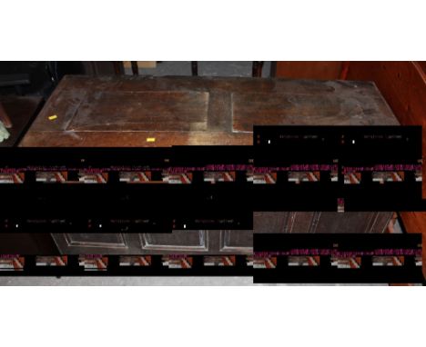 An 18th century oak four panel bedding chest / coffer of traditional form, the facia with faint inscribed initials 'I W' and 