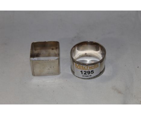 Two hallmarked silver napkin rings, gross weight 58 grams. CONDITION REPORT: Some slight compression to the circular napkin r