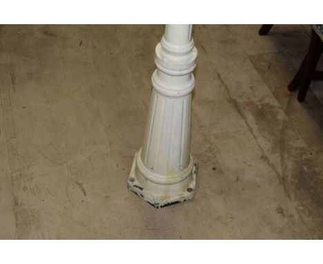 A cast aluminium exterior lantern stand of fluted and tapering form with hexagonal base, 183 cm high. CONDITION REPORT: White