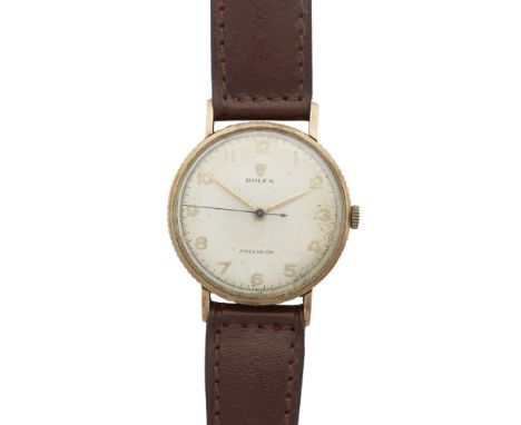 A gentleman's gold cased wrist watch, Rolex    Ref 4130, in a 'coin milled edge' case, milled detail on sides and lugs, cream