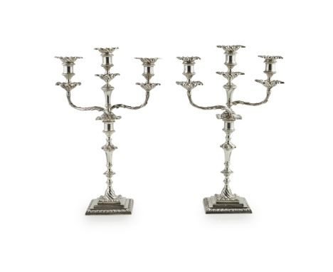 A suite of Victorian Scottish candelabra    Hamilton &amp; Inches, Edinburgh 1898, comprising two three light candelabra and 