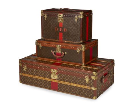 A set of three early 20th century Louis Vuitton trunks    comprising; a hat box, serial no. 819246, 61cm x 40cm 28.5cm; a ste