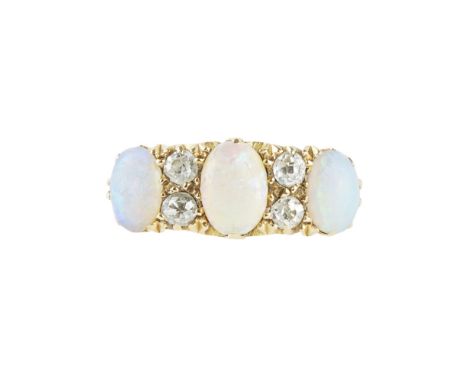 A 18ct gold diamond and opal set ring    claw set with three oval opals, between pairs of old-round cut diamonds, scrolling d