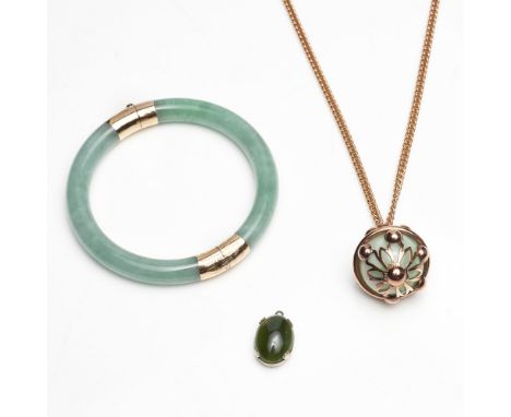 A collection of jade jewellery    to include a jade set hinged bangle with yellow metal mounts; a large spherical jade set pe
