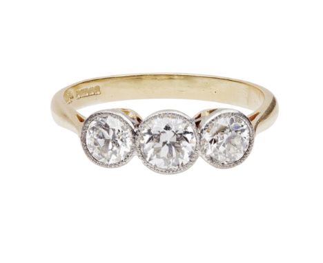 A three stone diamond ring    millegrain set with three graduated old-round cut diamonds, to a plain 18ct gold shank    Ring 