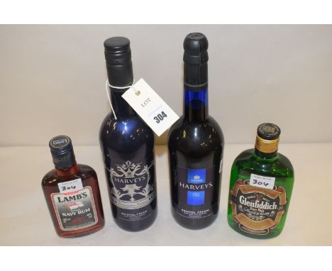 Two bottles of Harveys Coronation Edition Bristol Cream Sherry; a bottle of Lambs Navy Rum; and a bottle of Glenfiddich Pure 
