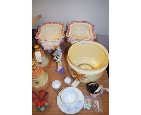 Two Bells Old scotch whisky decanters (with contents); a Royal Doulton character jug 'Gone Away'; a Meissen style teacup and 