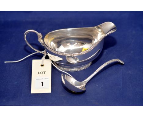 An Elizabeth II Lindisfarne pattern silver sauce boat, by J.B. Chatterley & Sons Ltd., Birmingham 1971; together with an Eliz