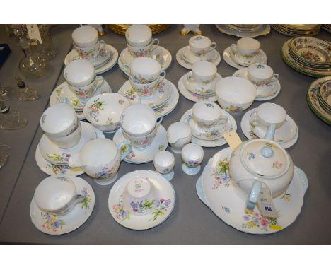A Shelley "Wild Flowers" pattern part tea and coffee service, to include: teapot, sandwich plates, teacups and saucers. and o