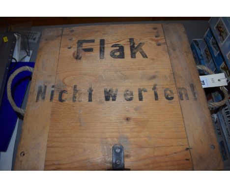 A WWII German ammunition box, the lid stencilled "Flak: Nicht werfen" and dated 1944 on a paper label inside; together with a