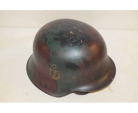 A WWII German SS helmet.
