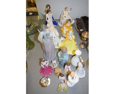 Royal Doulton figurines, to include: Ninette; Coralie; Coalport figures; two Nao figures; Swarovski turtle ornament; and othe