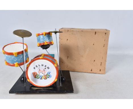 A BOXED PELHAM PUPPETS DRUM SET/KIT,  appears complete and in fairly good condition with only minor damage and wear, foam und